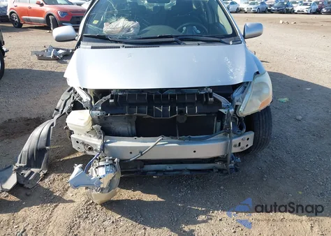 2010 Toyota Yaris из США, поврежденный, VIN JTDBT4K31A1390990